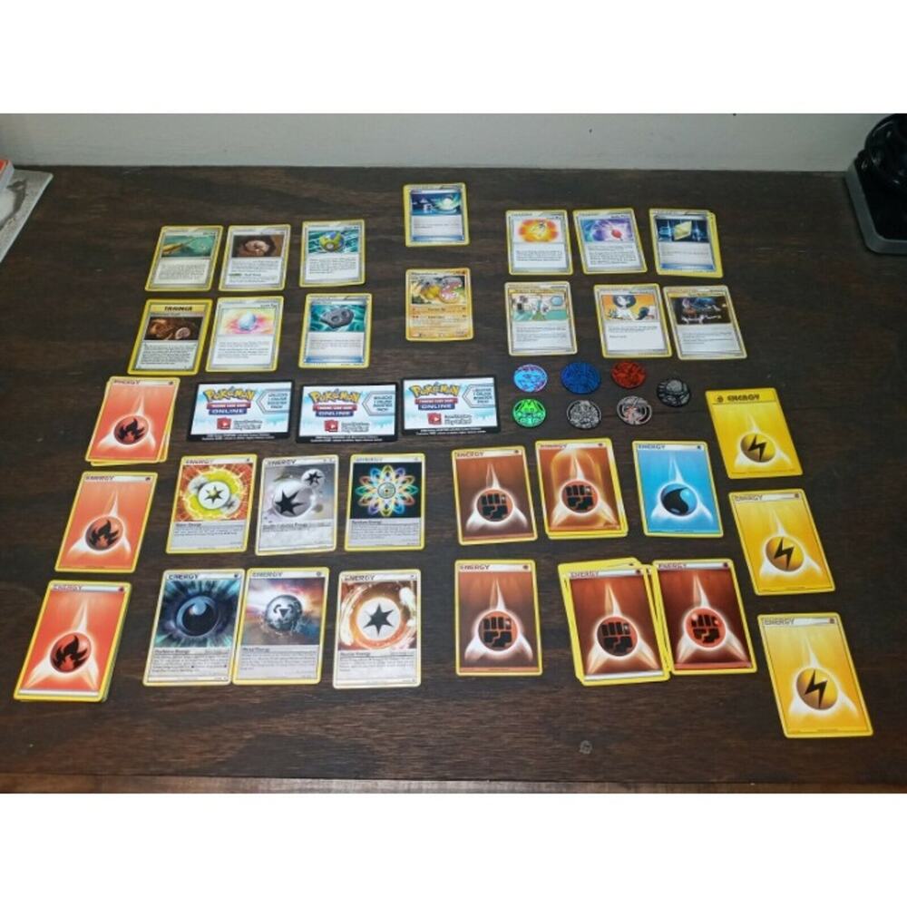 Pokemon Cards Trainer, Energy, and Supporter Set with a Bonus Pokemon and 7 Chip